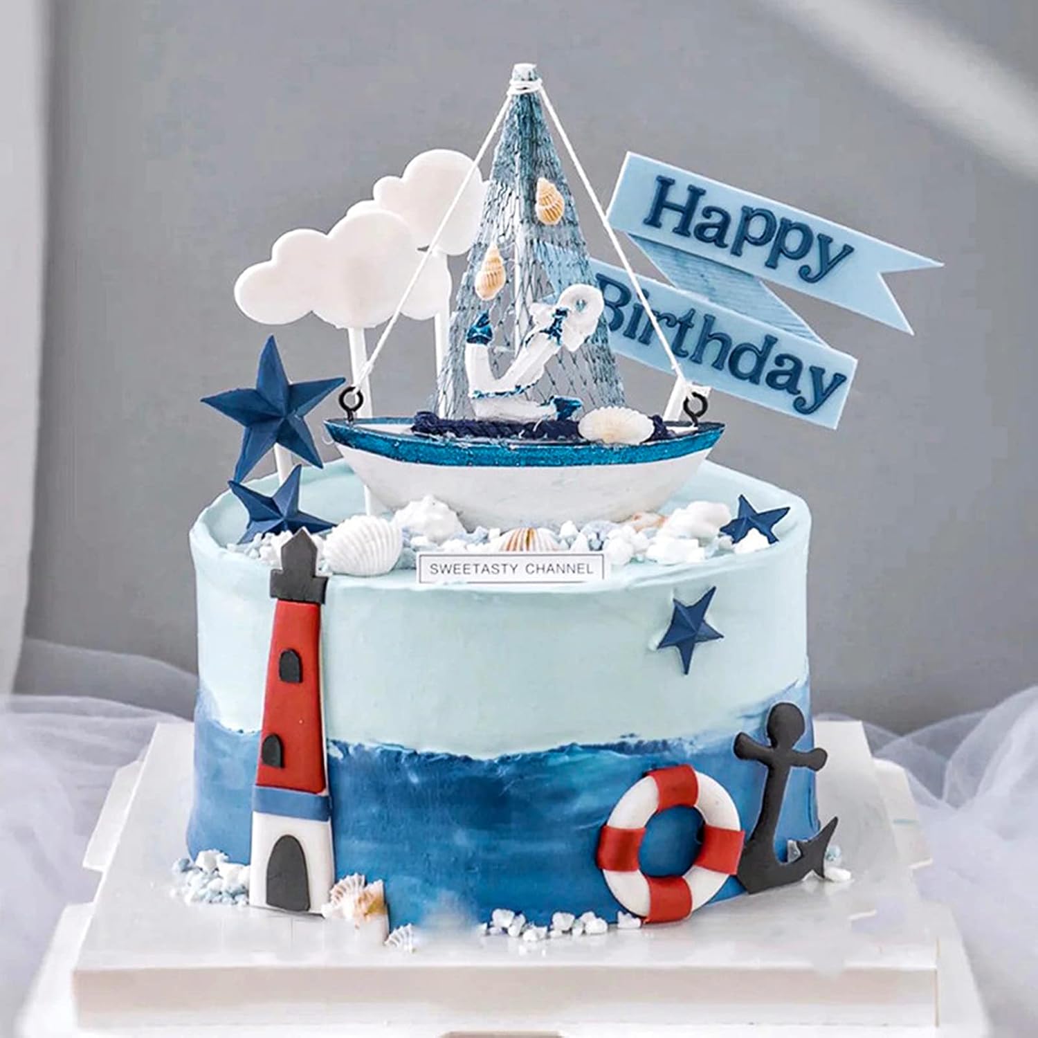 Set of two wooden sailboat decor ornaments by Amjkeji featuring miniature sailing boats for home, office, or maritime-themed events.