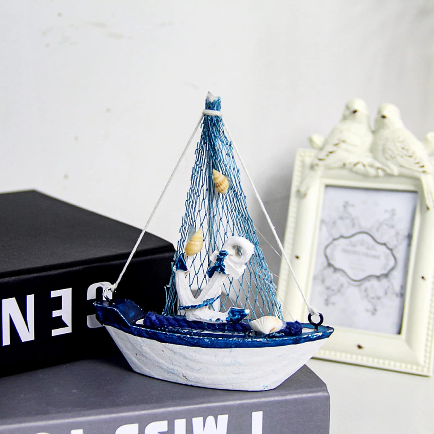 Set of two wooden sailboat decor ornaments by Amjkeji, miniature nautical sailing boats for home, office, or special occasions.