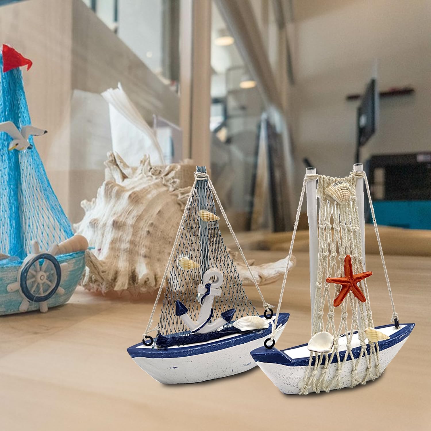 Two wooden sailboat decor ornaments by Amjkeji, miniature maritime sailing boats for home, office, or holiday decorations.