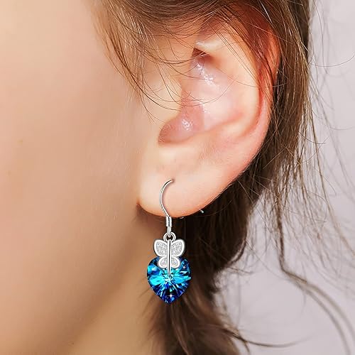 Infinionly blue crystal heart stud earrings in 925 sterling silver with butterfly zircon inlay, perfect for women.