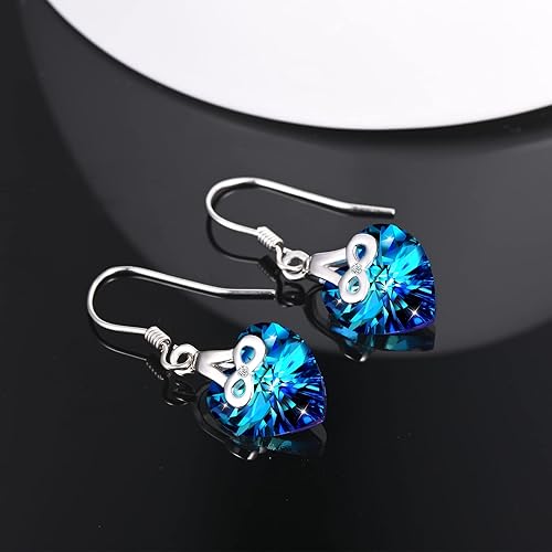 Infinionly blue crystal heart stud earrings in 925 silver with infinity symbol design, perfect for women and girls.