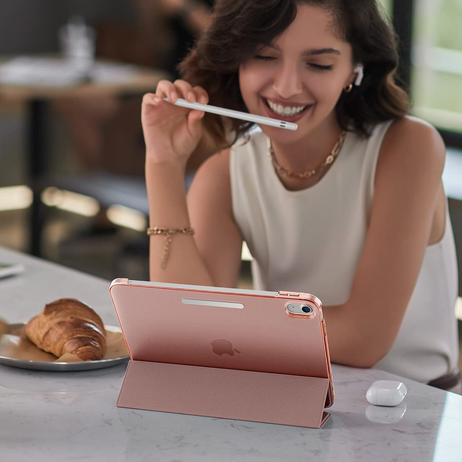 Rose gold ESR iPad case with 360° protection, 2-way stand, auto sleep/wake, trifold cover, and built-in pencil holder for iPad 10.9-inch