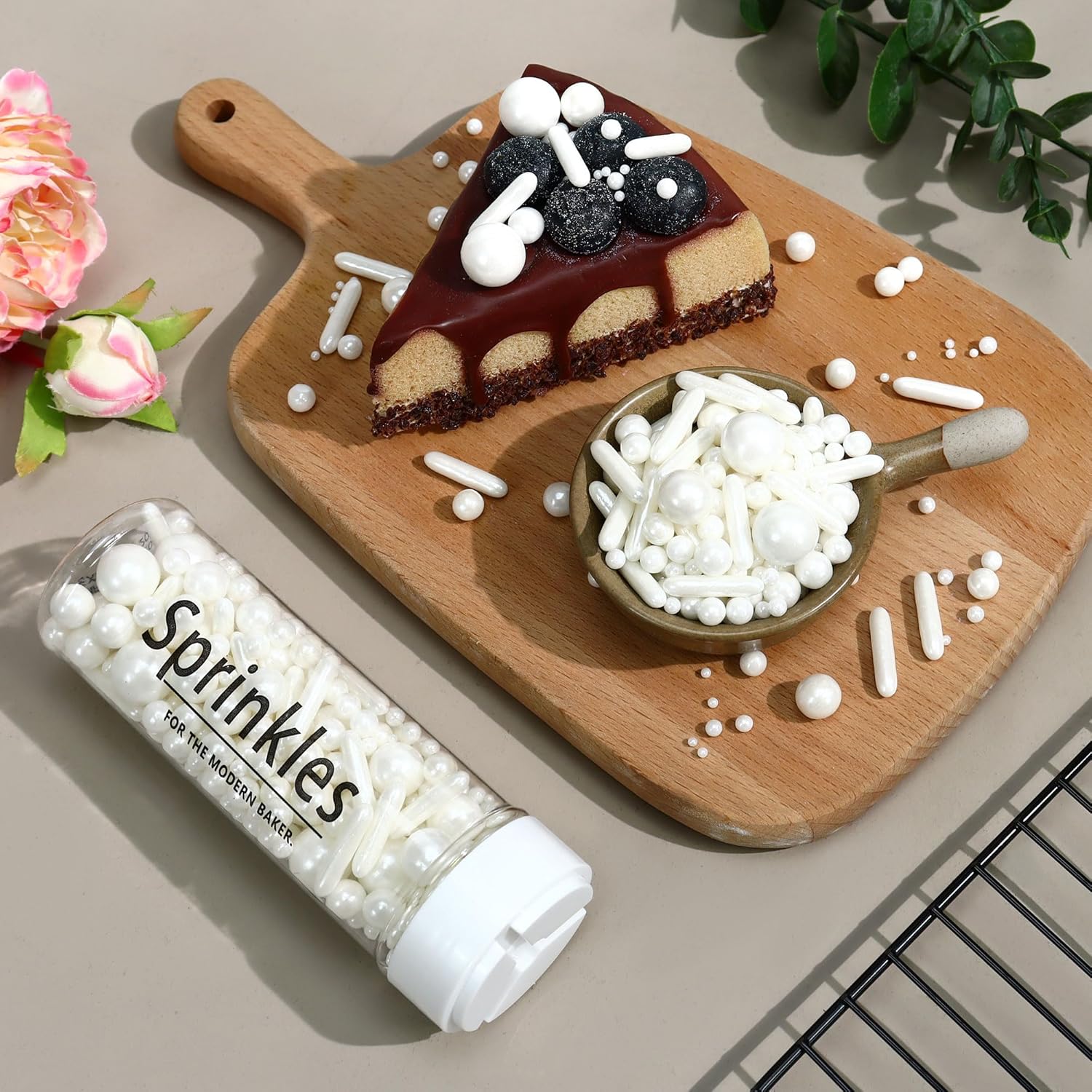 White edible pearl sprinkles from ZaoKing, perfect for decorating cakes, cupcakes, cookies, and desserts for special occasions.
