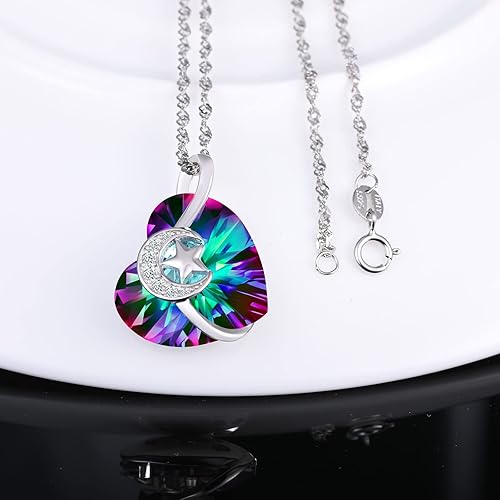Infinionly Heart of the Ocean necklace featuring a silver crystal pendant with star and moon design, multicoloured accents.