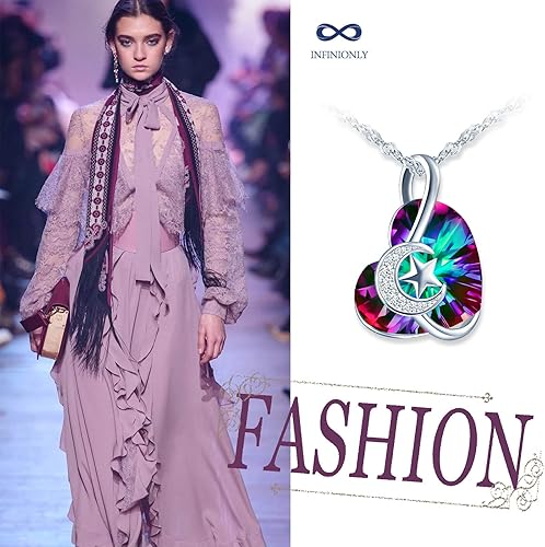 Infinionly Heart of the Ocean necklace with silver crystal pendant featuring star and moon design on a multicolored background