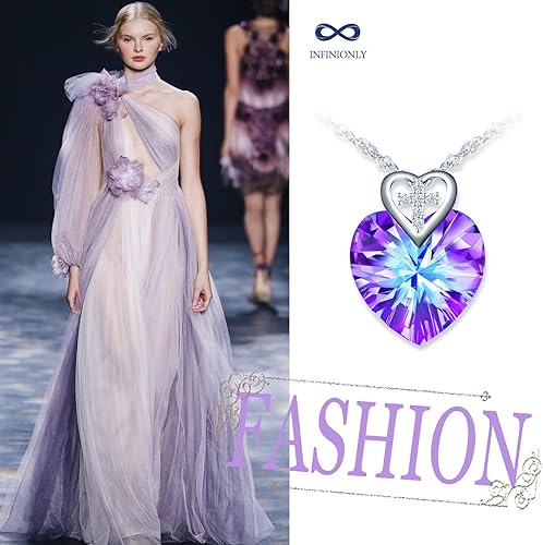 Infinionly Heart of the Ocean crystal necklace with sterling silver pendant featuring a mini heart and cross, purple light reflection.