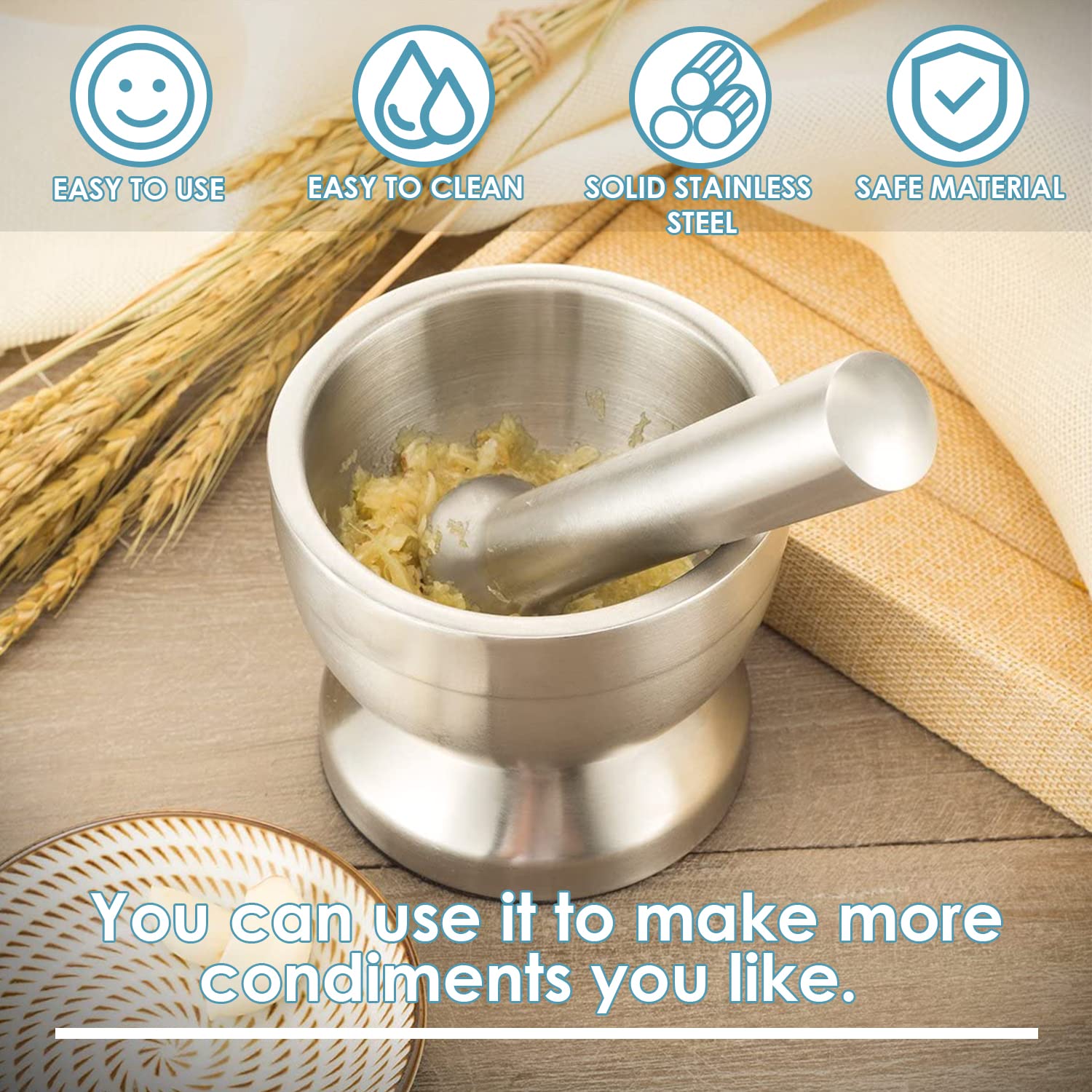 Keissco heavy-duty stainless steel mortar and pestle set with 1-cup capacity, non-skid base, silicone lid for grinding spices and herbs.
