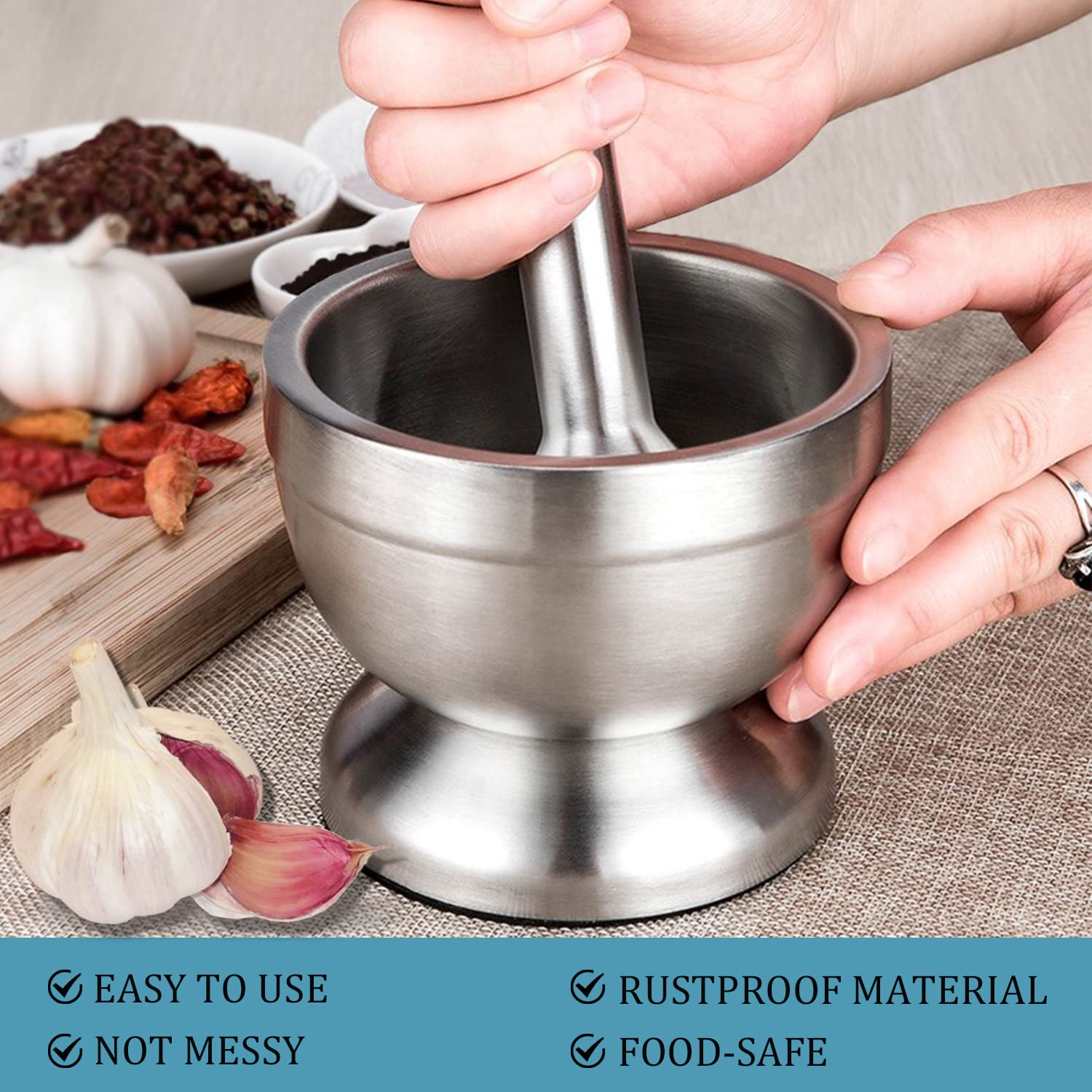 Keissco stainless steel mortar and pestle set with 1-cup capacity, non-skid base, silicone lid for grinding spices, herbs, and nuts.
