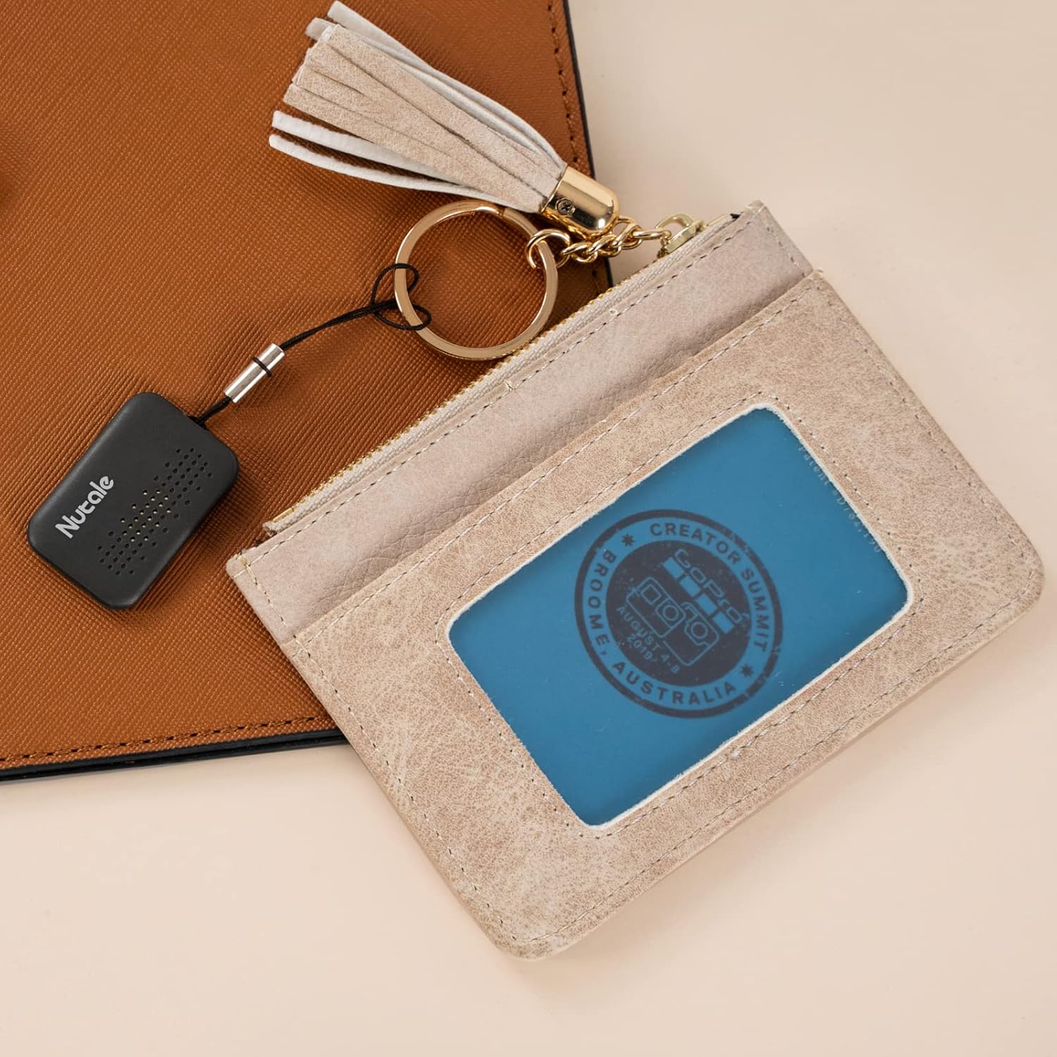 Nutale Mini Smart Finder Bluetooth key tracker and item locator for keys, wallet, and more with CR2016 battery included.