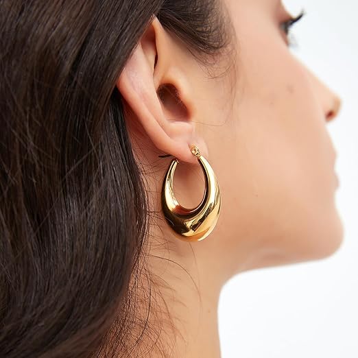 Pabbeu chunky gold and silver hoop earrings for women, lightweight hypoallergenic stainless steel oval earrings in various sizes.