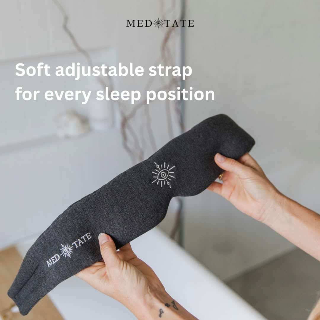 Black MEDEYETATE Total Blackout Sleep Mask with ultra-soft cotton, adjustable strap, breathable design, ideal for deep sleep and travel.
