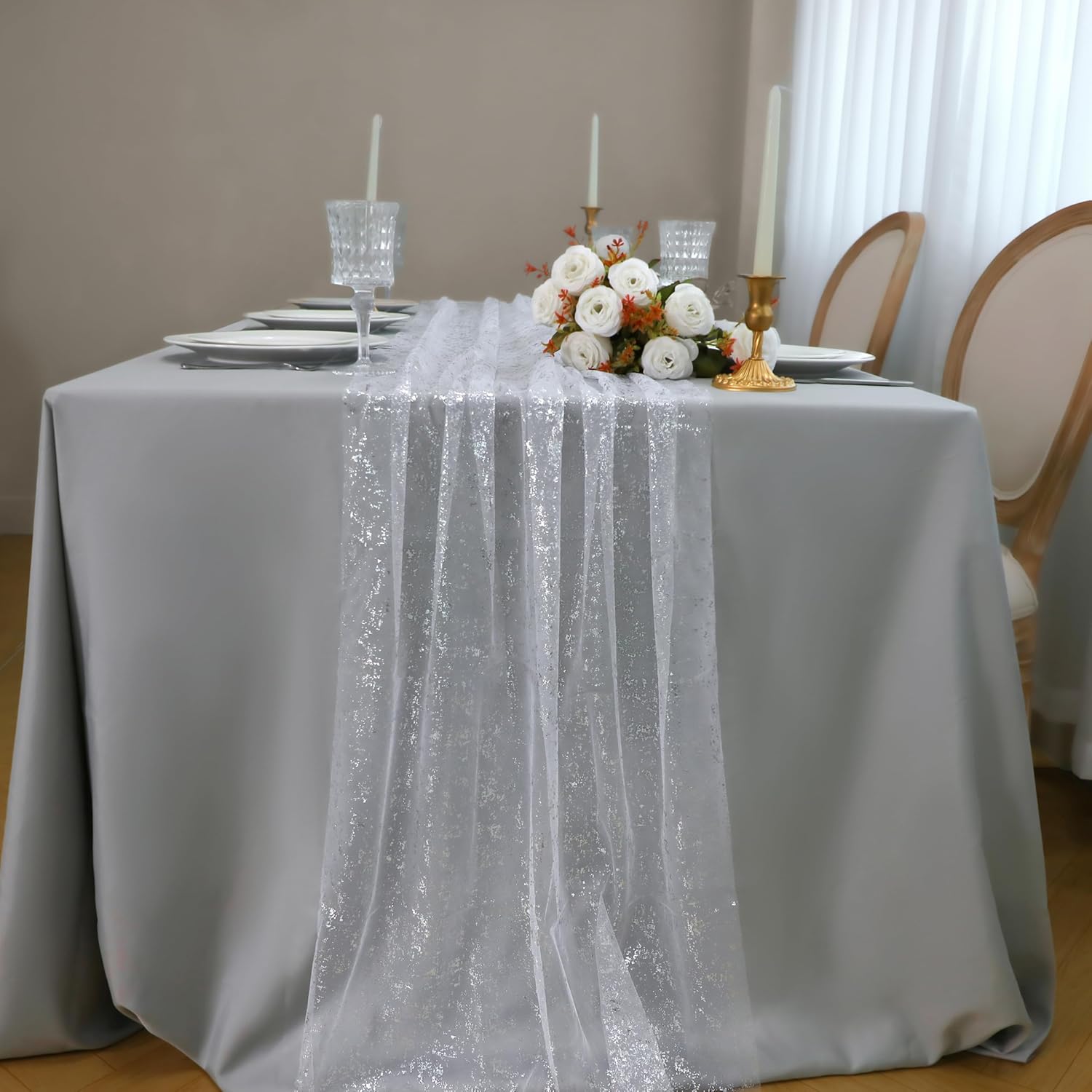 Snowkingdom 10FT silver glitter cheesecloth table runner with sequins, sheer gauze fabric, ideal for wedding, birthday, and holiday decor.
